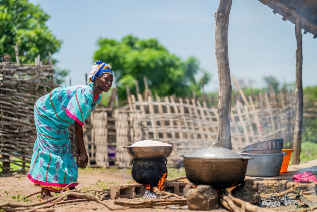 A woman cooklng Guinea-Bissau